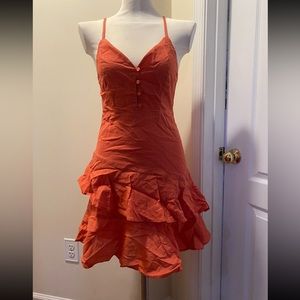 Spaghetti strap dress. Orange. Ruffles. Brand: Free People.
